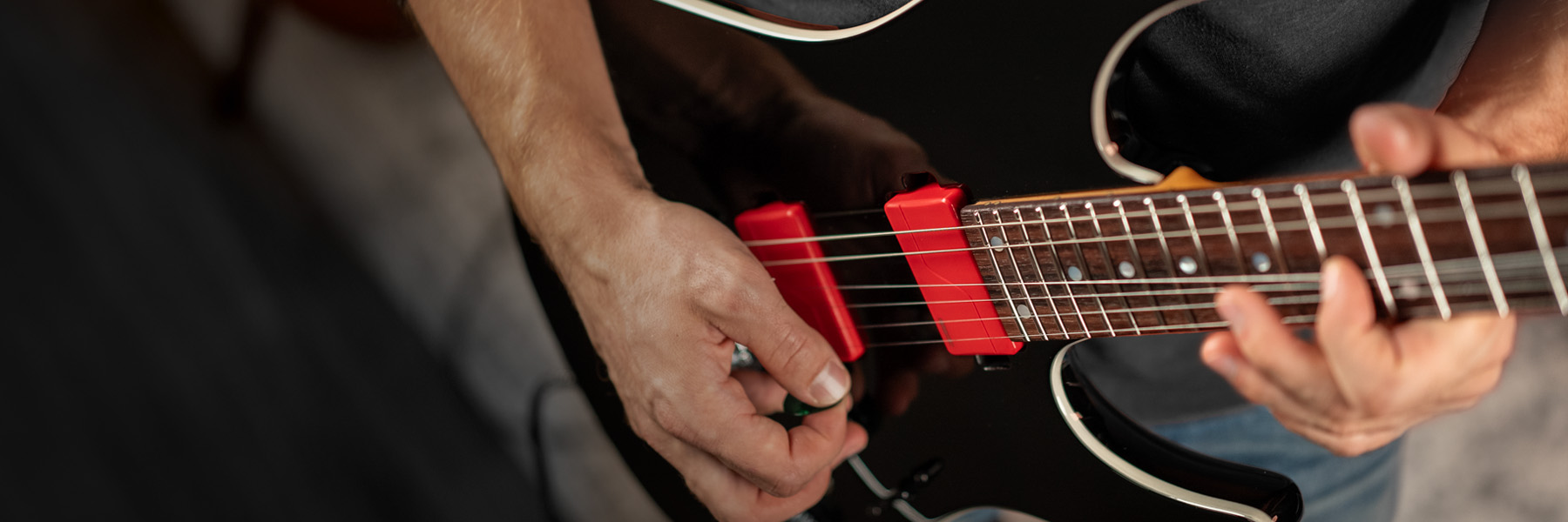 Guitarist performing with his guitar equipped with Fluence Modern Humbucker 6-String guitar pickups